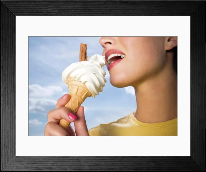 Framed Print : Woman eating ice cream Framed Print : Woman eating ice cream