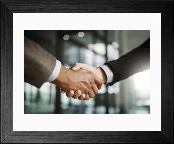 Framed Print : Closeup of business men giving handshake Framed Print : Closeup of business men giving handshake