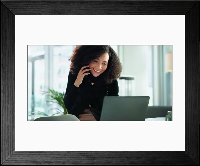 Framed Print : Business, woman and phone call with laptop in office for communication Framed Print : Business, woman and phone call with laptop in office for communication