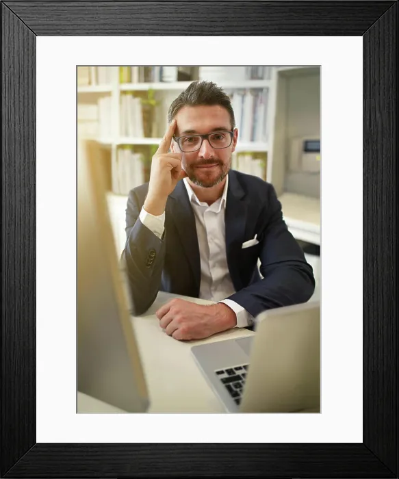 Framed Print : Glasses, office and portrait of businessman with computer for working online