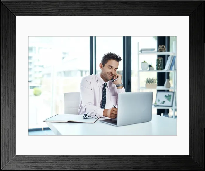 Framed Print : Laptop, phone call and writing with financial advisor man in office for communication or trading