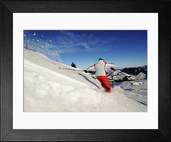 Framed Print : Skier skiing through powder snow on the Kitzlahner-Hang run Framed Print : Skier skiing through powder snow on the Kitzlahner-Hang run