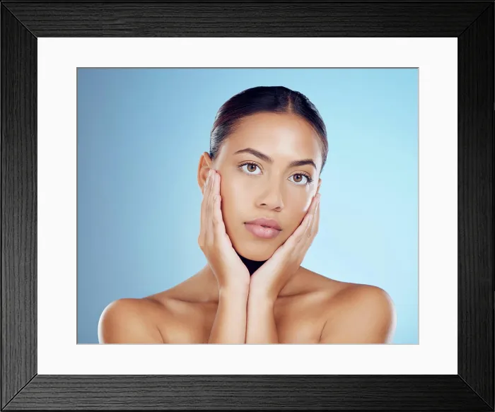 Framed Print : Face, woman and dermatology beauty on blue background for skincare Framed Print : Face, woman and dermatology beauty on blue background for skincare