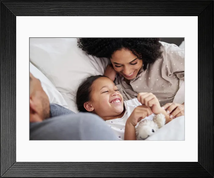 Framed Print : Family, laughing and care on bed with smile for wellness