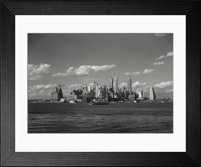Framed Print : Vintage Photograph. View of New York City Skyline from across the East River with ferries passing Framed Print : Vintage Photograph. View of New York City Skyline from across the East River with ferries passing