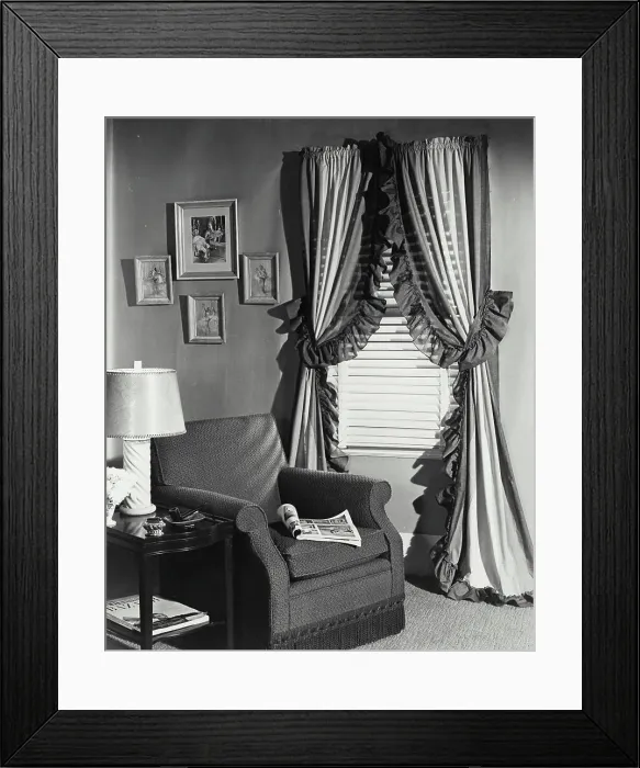 Framed Print : Vintage photograph. Living room with striped - chambray curtains Framed Print : Vintage photograph. Living room with striped - chambray curtains
