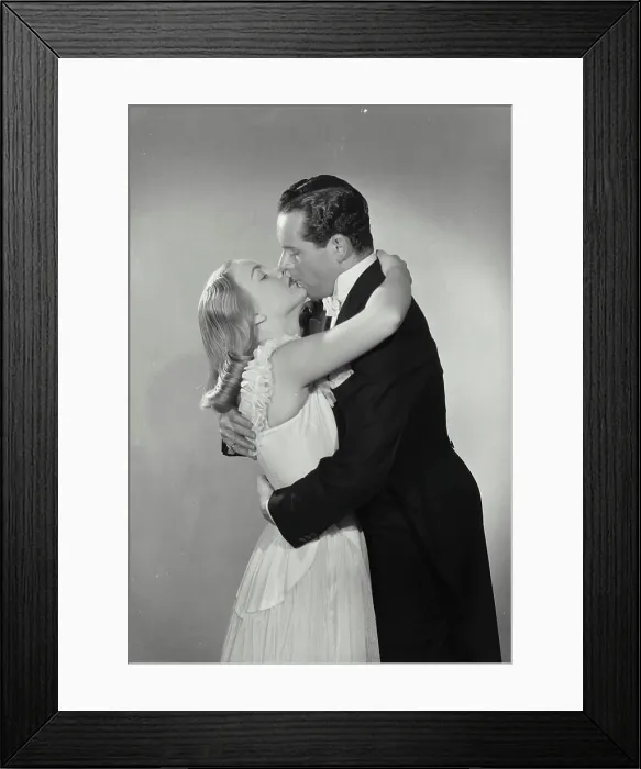 Framed Print : Vintage photograph. Man kissing and hugging woman Framed Print : Vintage photograph. Man kissing and hugging woman