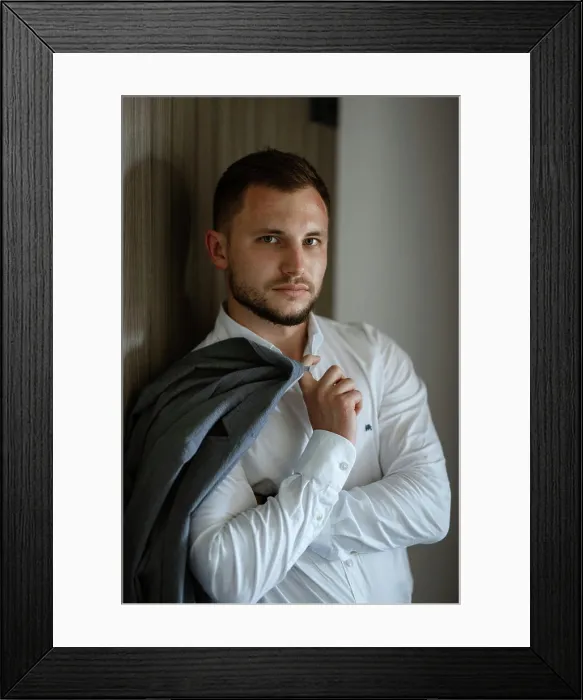 Framed Print : portrait of smiling groom with beard in blue color suit Framed Print : portrait of smiling groom with beard in blue color suit