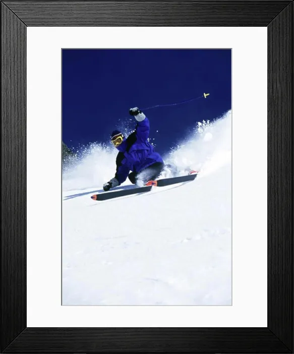 Framed Print : Low angle view of a man skiing