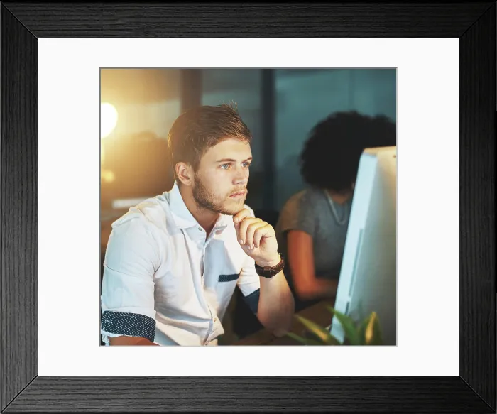 Framed Print : Computer, ideas and businessman in office at night with research for coding on website development Framed Print : Computer, ideas and businessman in office at night with research for coding on website development