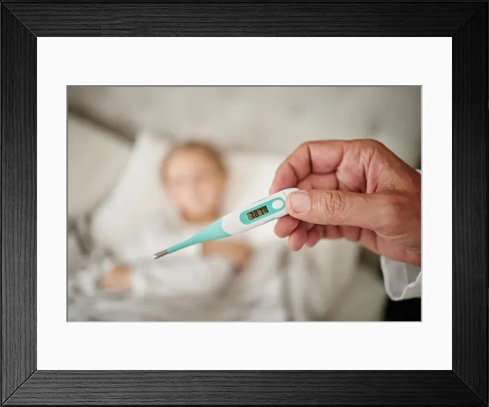 Framed Print : Parent, hand and reading thermometer for sick child in bed to monitor temperature for fever or covid infection Framed Print : Parent, hand and reading thermometer for sick child in bed to monitor temperature for fever or covid infection