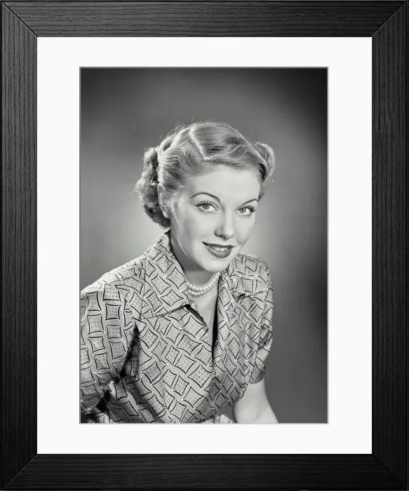 Framed Print : Vintage photograph. Blonde woman wearing blouse with diamond / polka dot pattern Framed Print : Vintage photograph. Blonde woman wearing blouse with diamond / polka dot pattern