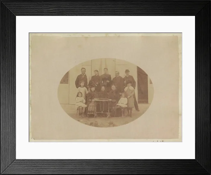Framed Print : Group portrait of three men, five women and four children standing at a table in France Framed Print : Group portrait of three men, five women and four children standing at a table in France