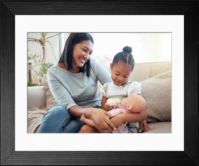 Framed Print : Mother, love and child with toys happy together on sofa in living room at home for relationship bonding Framed Print : Mother, love and child with toys happy together on sofa in living room at home for relationship bonding