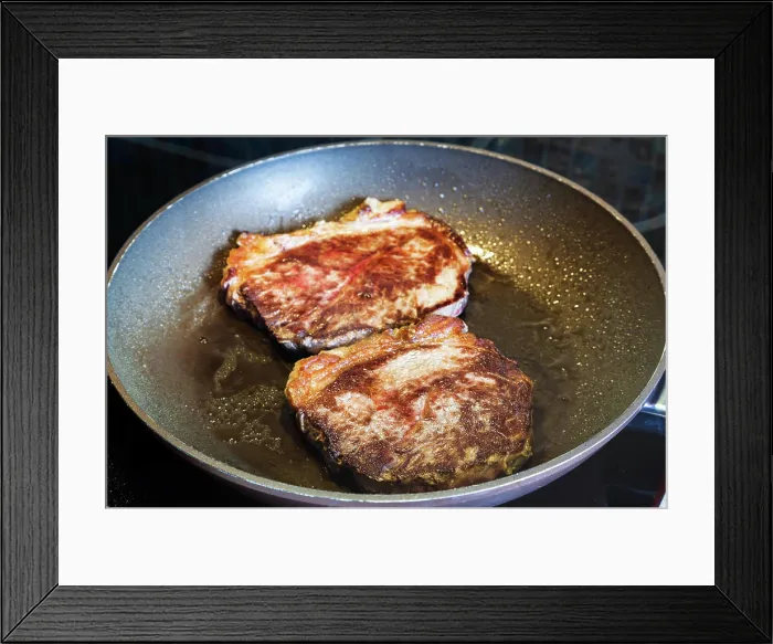 Framed Print : two roasted piece of meat in frying pan on range two roasted piece of meat in frying pan on ceramic electric range Framed Print : two roasted piece of meat in frying pan on range two roasted piece of meat in frying pan on ceramic electric range