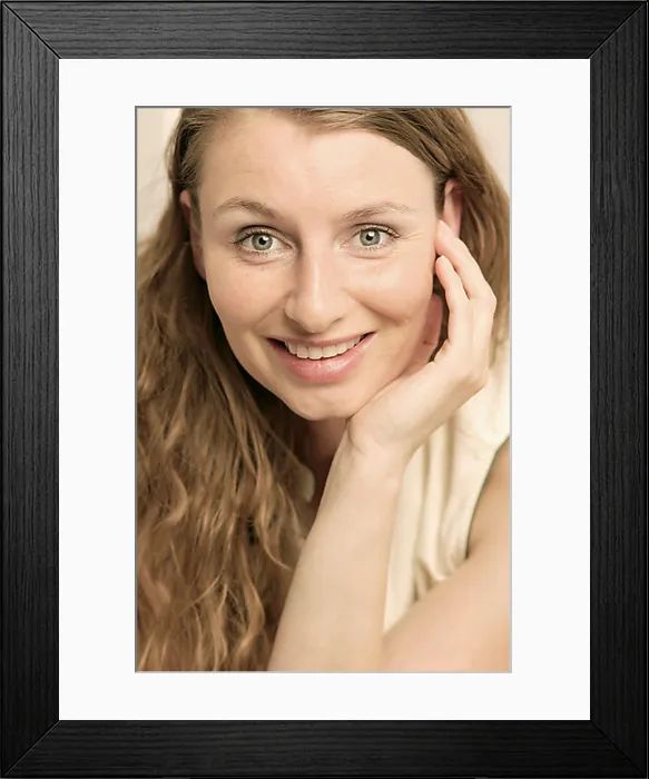 Framed Print : A smiling woman with long brunette hair Framed Print : A smiling woman with long brunette hair