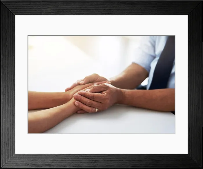 Framed Print : Holding hands, psychologist and patient for comfort