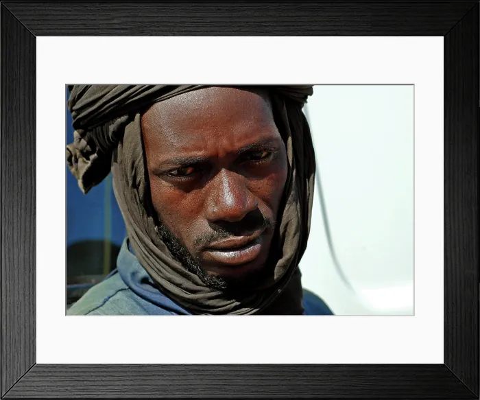 Framed Print : MALI, Mopti. Portrait of a touareg man dressed in black (RF) (MR) Framed Print : MALI, Mopti. Portrait of a touareg man dressed in black (RF) (MR)
