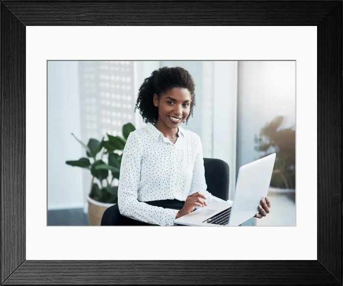 Framed Print : Black woman, portrait and laptop on lap in office for reading emails Framed Print : Black woman, portrait and laptop on lap in office for reading emails