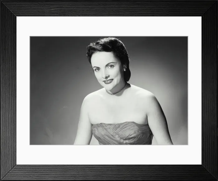 Framed Print : Vintage Photograph. Woman in strapless dress and chain necklace with pleasant smile Framed Print : Vintage Photograph. Woman in strapless dress and chain necklace with pleasant smile