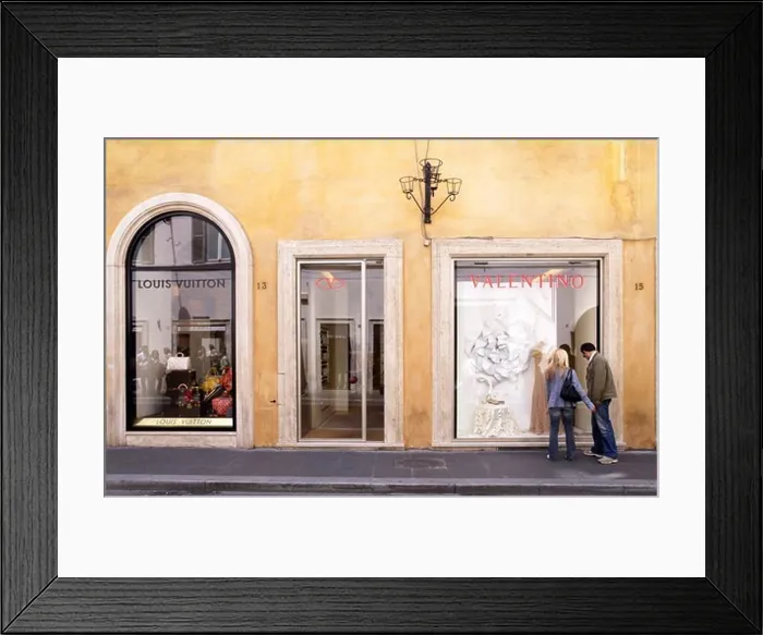 Framed Print : Couple strolling along Via Condotti, Rome, Italy Framed Print : Couple strolling along Via Condotti, Rome, Italy
