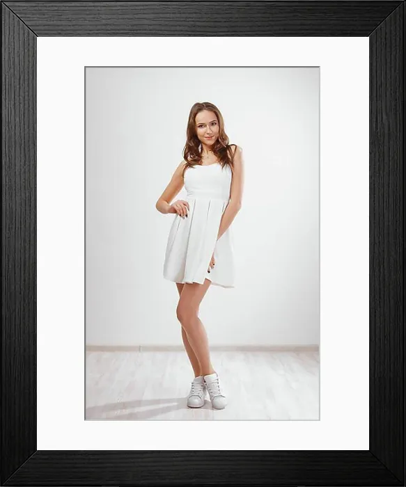 Framed Print : Pretty young girl in white short dress spinning around. Dynamic studio photoshot Framed Print : Pretty young girl in white short dress spinning around. Dynamic studio photoshot