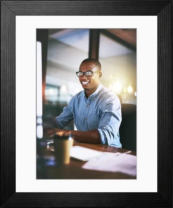Framed Print : Night, computer and black man in office for business Framed Print : Night, computer and black man in office for business