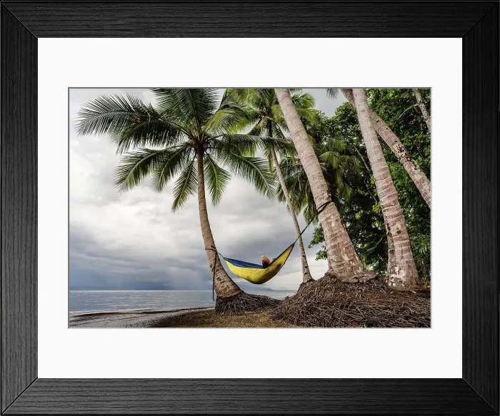 Framed Print : Adult relaxing in hammock at beach in Costa Rica Framed Print : Adult relaxing in hammock at beach in Costa Rica