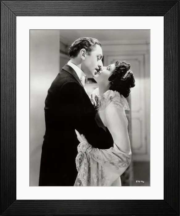 Framed Print : Couple kissing indoors Framed Print : Couple kissing indoors
