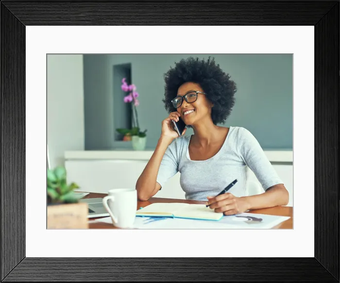 Framed Print : Woman, phone call and note book with schedule for copywriter Framed Print : Woman, phone call and note book with schedule for copywriter