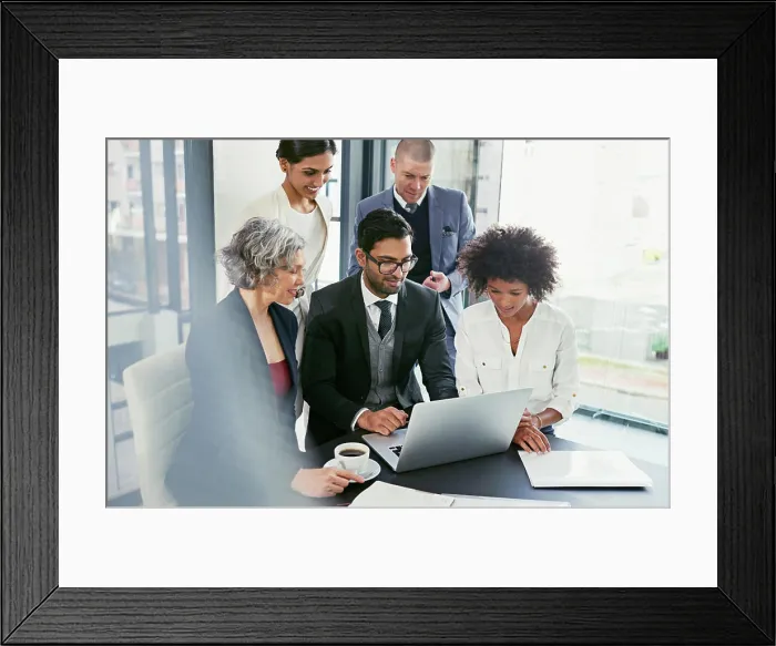 Framed Print : Business people, meeting or laptop with manager for project planning or development at corporate office