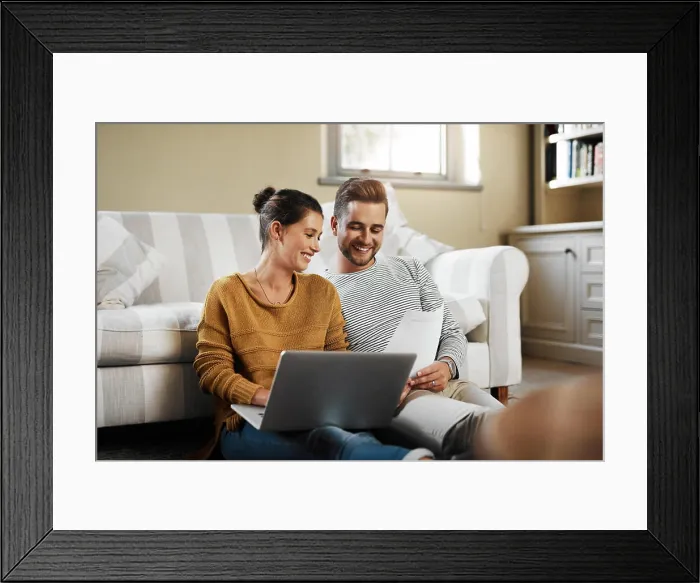 Framed Print : Laptop, planning and documents with couple in living room for investment portfolio