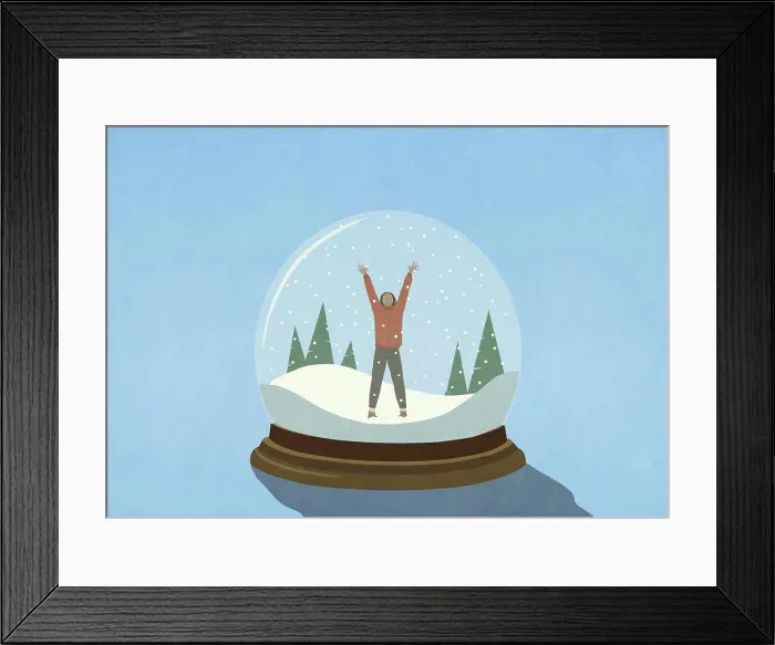 Framed Print : Woman with arms raised inside snow globe Framed Print : Woman with arms raised inside snow globe