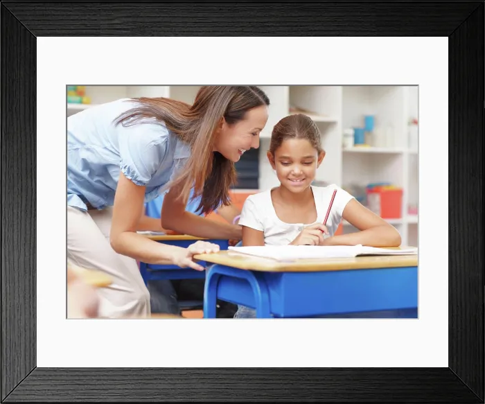 Framed Print : Education, advice and teacher with student in classroom for learning Framed Print : Education, advice and teacher with student in classroom for learning