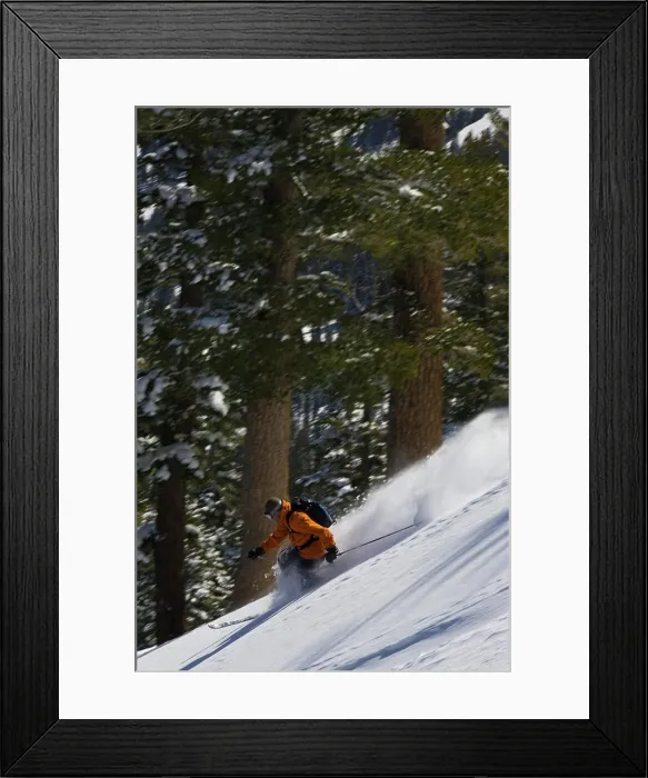 Framed Print : A backcountry telemark skier makes turns in powder snow near Kirkwood, California Framed Print : A backcountry telemark skier makes turns in powder snow near Kirkwood, California
