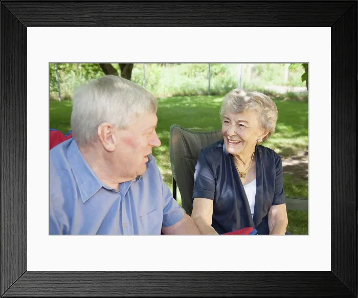 Framed Print : a man and a woman sit talking, edmonton, alberta, canada Framed Print : a man and a woman sit talking, edmonton, alberta, canada