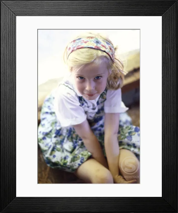 Framed Print : Portrait of a girl sitting Framed Print : Portrait of a girl sitting