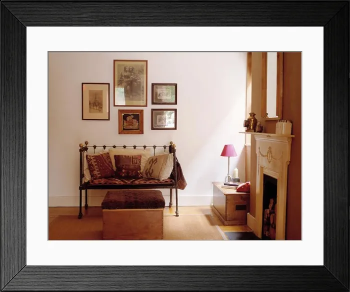 Framed Print : Kelim cushions on small metal settle in uncluttered living room Framed Print : Kelim cushions on small metal settle in uncluttered living room