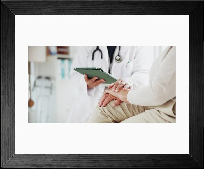 Framed Print : Tablet, doctor and holding hands of old woman in office for consulting Framed Print : Tablet, doctor and holding hands of old woman in office for consulting