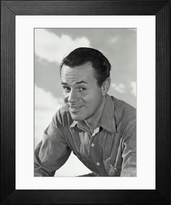 Framed Print : Vintage photograph. Man in button shirt smiling at camera Framed Print : Vintage photograph. Man in button shirt smiling at camera