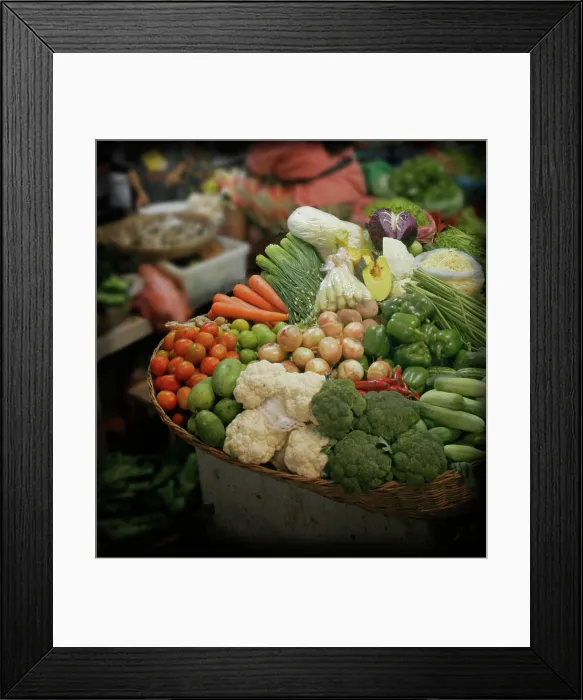 Framed Print : Business goes on at a greengrocer's stall in the wet market, known to locals as Psar Chas, in Siem Reap, Cambodia