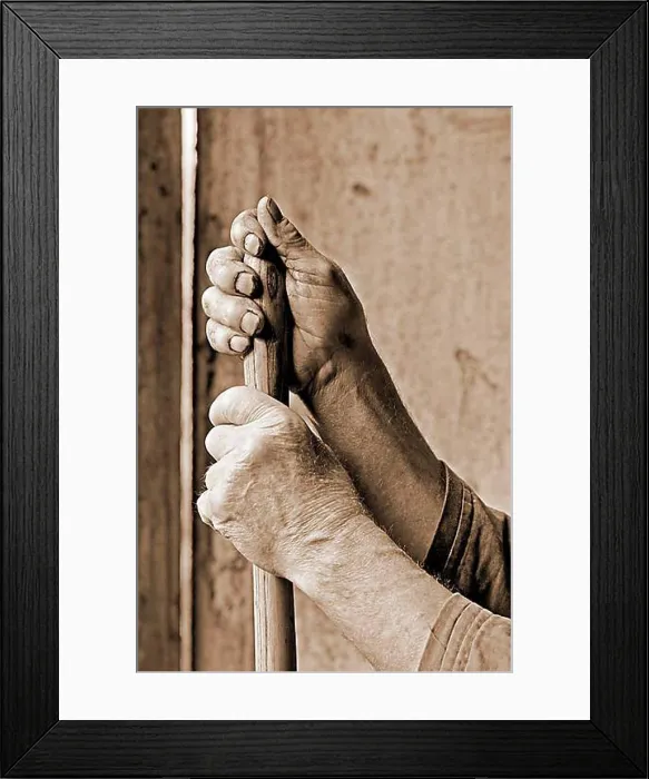 Framed Print : Hands marked by hard work supported on a pitchfork Framed Print : Hands marked by hard work supported on a pitchfork