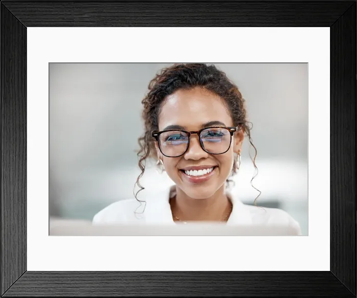 Framed Print : Portrait, smile and business woman in glasses on laptop in office for software development in startup