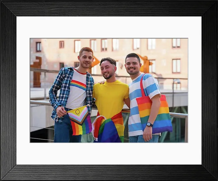 Framed Print : Portrait of man at the rally with the rainbow flags, gay pride party in the city, lgbt concept Framed Print : Portrait of man at the rally with the rainbow flags, gay pride party in the city, lgbt concept