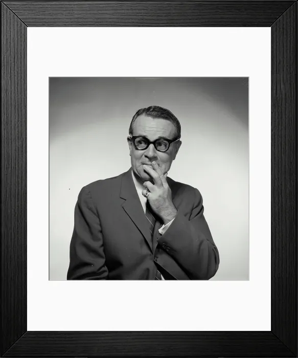 Framed Print : Businessman with his fingers on his lips Framed Print : Businessman with his fingers on his lips