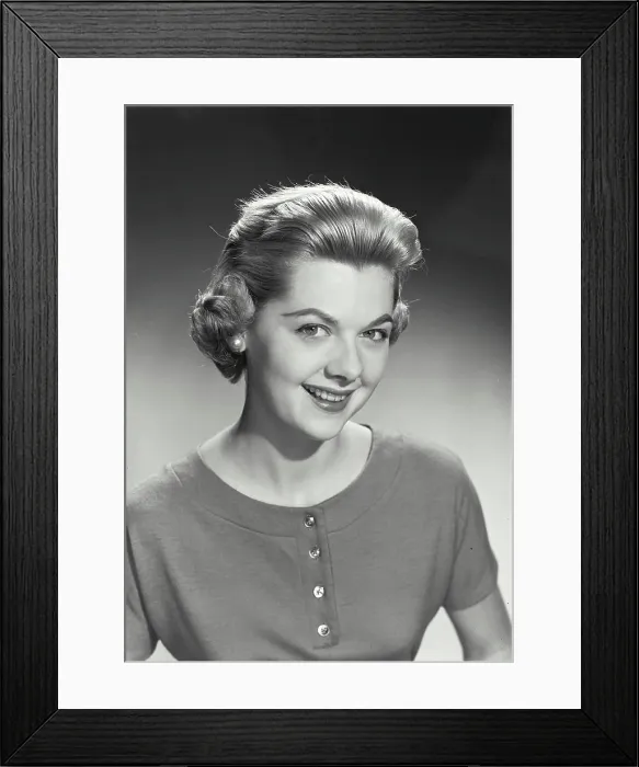 Framed Print : Portrait of a young woman smiling Framed Print : Portrait of a young woman smiling