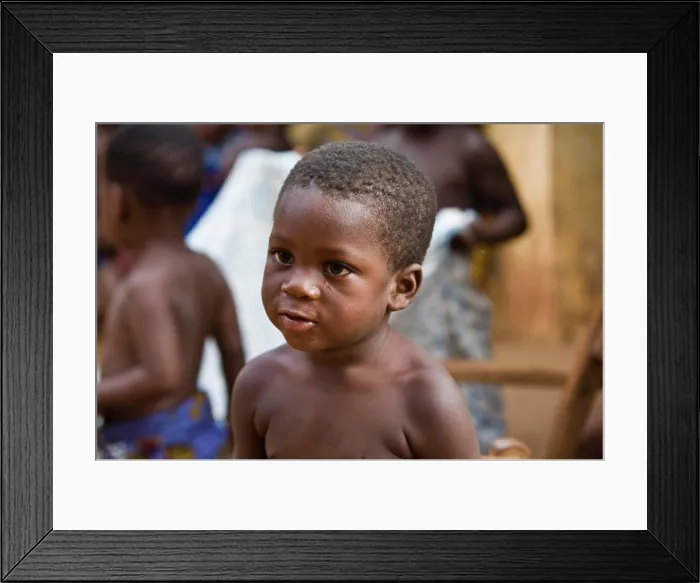 Framed Print : Africa, West Africa, Togo, Atitogan. Close-up portrait of child at voodoo ceremony in small village of Atitogan in Togo Framed Print : Africa, West Africa, Togo, Atitogan. Close-up portrait of child at voodoo ceremony in small village of Atitogan in Togo