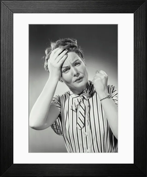 Framed Print : Vintage photograph. Portrait of woman in striped blouse with hand on forehead in pain Framed Print : Vintage photograph. Portrait of woman in striped blouse with hand on forehead in pain
