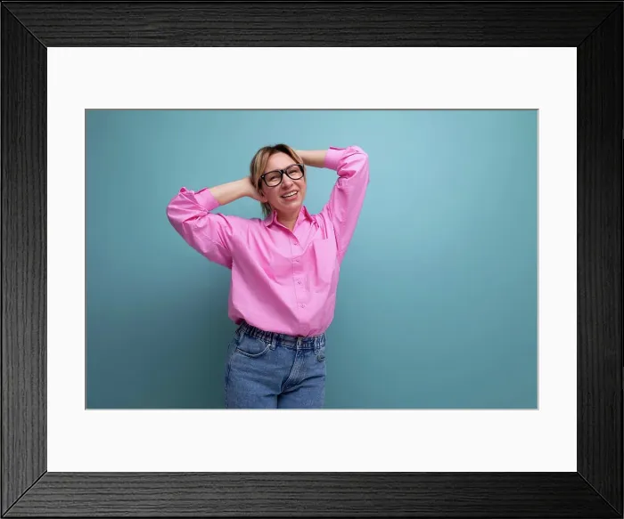 Framed Print : dreamy positive young blond caucasian woman model with ponytail hairstyle in stylish look consisting of pink blouse Framed Print : dreamy positive young blond caucasian woman model with ponytail hairstyle in stylish look consisting of pink blouse