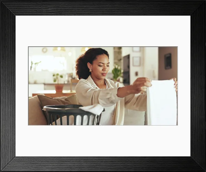 Framed Print : Woman, laundry and fold clothes in basket with fresh linen Framed Print : Woman, laundry and fold clothes in basket with fresh linen